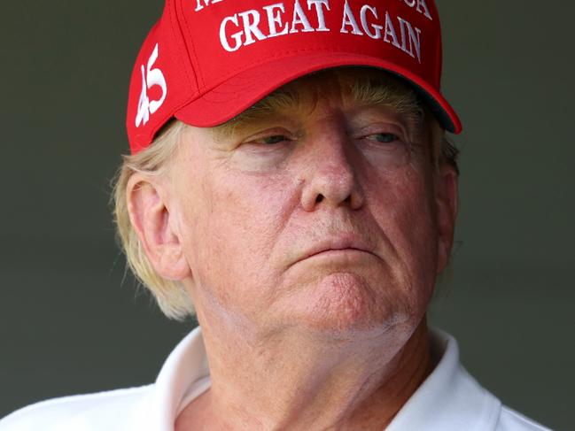 STERLING, VIRGINIA - MAY 26: Former US President Donald Trump watches from a box on the 18th green during day one of the LIV Golf Invitational - DC at Trump National Golf Club on May 26, 2023 in Sterling, Virginia. (Photo by Rob Carr/Getty Images) *** BESTPIX ***