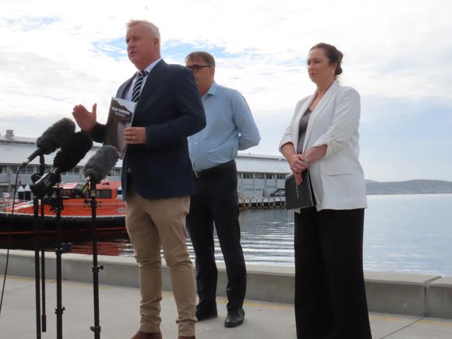 Premier Jeremy Rockliff, TCCI Chair Wayne Davy and TICT CEO Amy Hills speak to the media on the waterfront in Hobart on Monday, March 3, 2025.