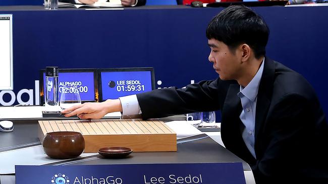 Lee Se-Dol, the world's top-ranked Go player, makes a move against Google-developed AI supercomputer AlphaGo in Seoul. AlphaGo stunned observers last year by trouncing South Korean grandmaster four games to one.