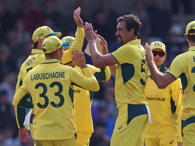 Australia's Mitchell Starc (C) celebrates with teammates after taking the wicket of England's Harry Brook during the 2nd One Day International cricket match between England and Australia at Headingley in Leeds, northern England  on September 21, 2024. (Photo by Darren Staples / AFP) / RESTRICTED TO EDITORIAL USE. NO ASSOCIATION WITH DIRECT COMPETITOR OF SPONSOR, PARTNER, OR SUPPLIER OF THE ECB