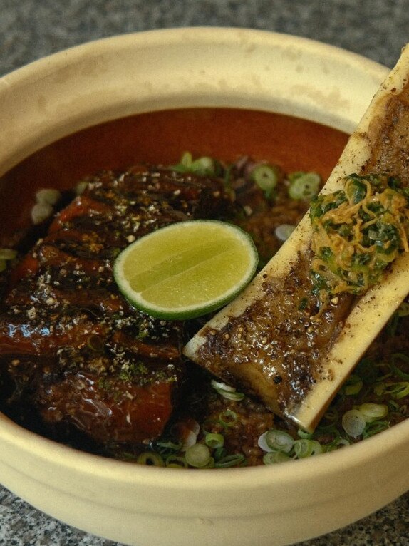 Beef with a ‘pares’ claypot of crispy confit garlic rice, braised oxtail and roasted bone marrow.