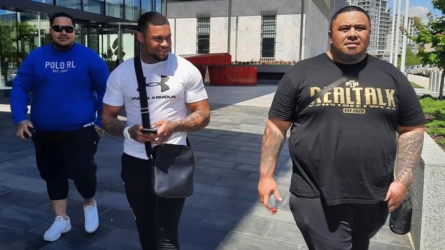 Canberra Comanchero bikies Penaia Tuineau (left) Sugimatatihuna Mena and Taniela Tai leave the ACT Magistrates Court after being found not guilty of affray. Picture: Craig Dunlop