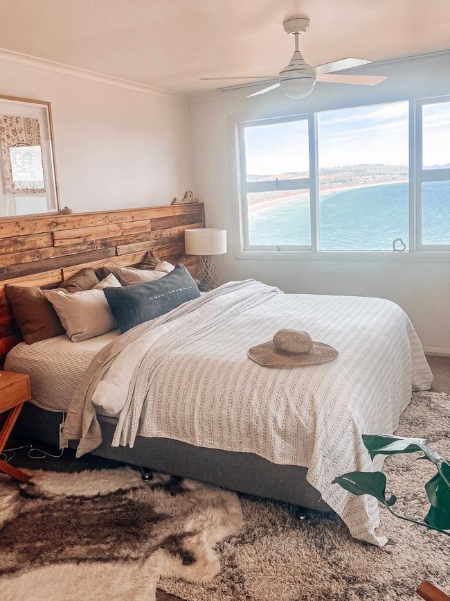 The main bedroom at Cliff Top On Park features stunning, sweeping views of Park Beach and beyond. Picture: Beansy Lee.