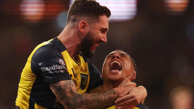 An elated Sammy Silvera (right) celebrates with teammate Storm Roux after scoring for the Mariners in last season’s A-League grand final. Picture: Mark Kolbe/Getty Images