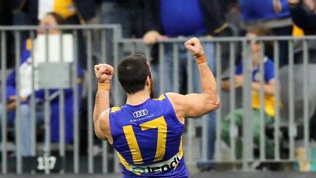 Josh Kennedy celebrates to the crowd after his matchwinner. Picture: Will Russell/AFL Photos via Getty Images