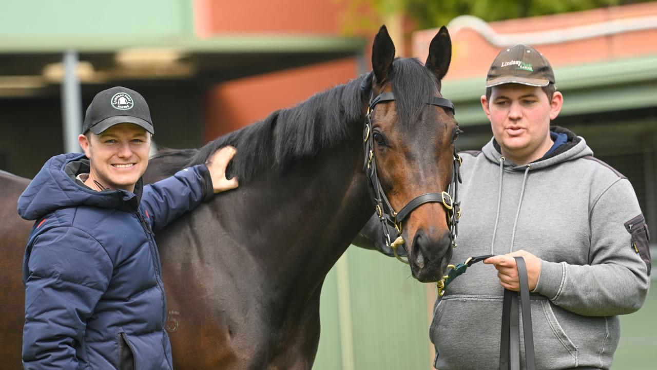 Trainer Ben Hayes and strapper William Evans with Mr Brightside at Flemington on Friday. Picture: Vince Caligiuri/Getty Images