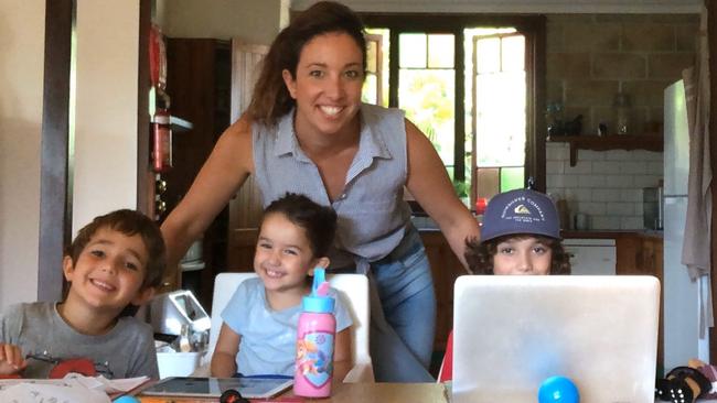 Tegan Swan with her children Tasman, Evelyn and Lincoln at home during the height of COVID-19 last year.