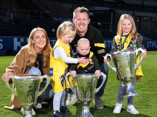 MELBOURNE, AUSTRALIA - AUGUST 15: Jack Riewoldt poses with his wife Carly and children, Hazel, Tommy and Poppy after announcing his retirement from AFL today, at Punt Road Oval on August 15, 2023 in Melbourne, Australia. (Photo by Morgan Hancock/Getty Images)