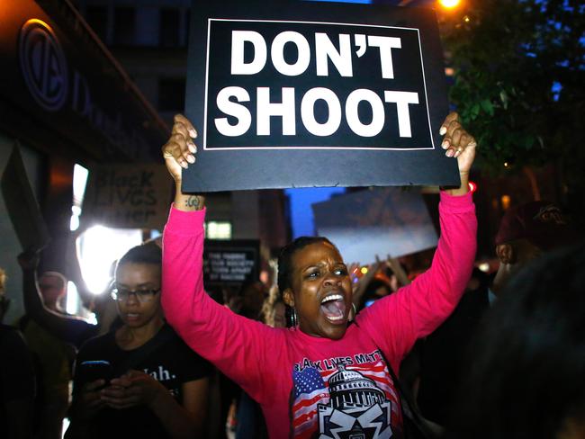 A woman holds a banner during a protest in support of the Black Lives Matter movement in New York. Picture: AFP