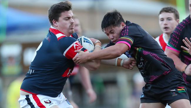 Erina’s Tom Richmond in action against Berkeley Vale. Picture: Sue Graham