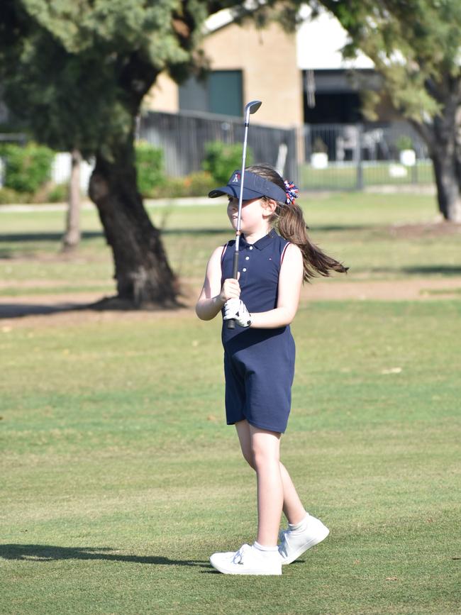 Adelaide's Frankie Mae Flett (girls eight years and under) watches her ball closely during play at the US Kids Golf Foundation Australian Open at the Rockhampton Golf Club on September 27.