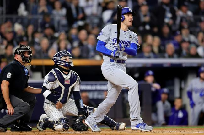 Los Angeles slugger Freddie Freeman watches his two-run homer in the first inning that helped the Dodgers to victory over the New York Yankees in game three of the World Series