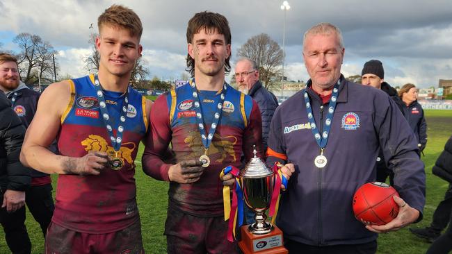 Kain, Tye and Gary Hall with the NFNL Division 2 premiership cup.