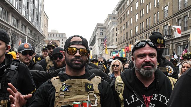 Enrique Tarrio, leader of the Proud Boys and Joe Biggs gather outside of Harry's bar during a protest in Washington, DC. Picture: Stephanie Keith/Getty Images/AFP