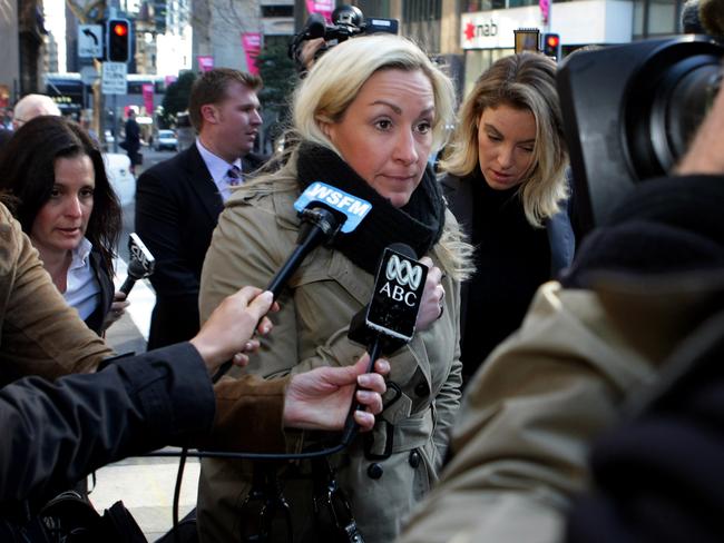 Keli Lane is surrounded by the media as she arrives at court during her trial.