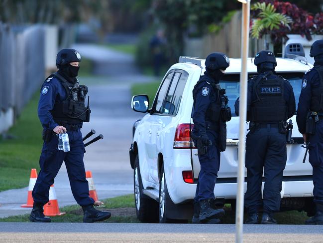 Police at the scene of the 27-hour operation at Alexandra Headland on the Sunshine Coast Picture: AAP Image/Darren England