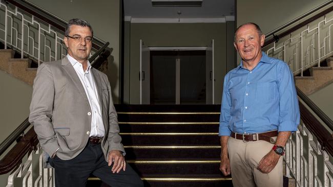 Joseph Carrozzi, harbour trust chairman and Colonel John Platt pose for a photo in the entrance of 'The Other Ranks Mess' building at the School of Artillery North Head, Manly on Wednesday, 14 October 2020. John Platt, was the last commanding officer of the school of artillery before it shut in 1998. Picture: NCA NewsWire/ Monique Harmer