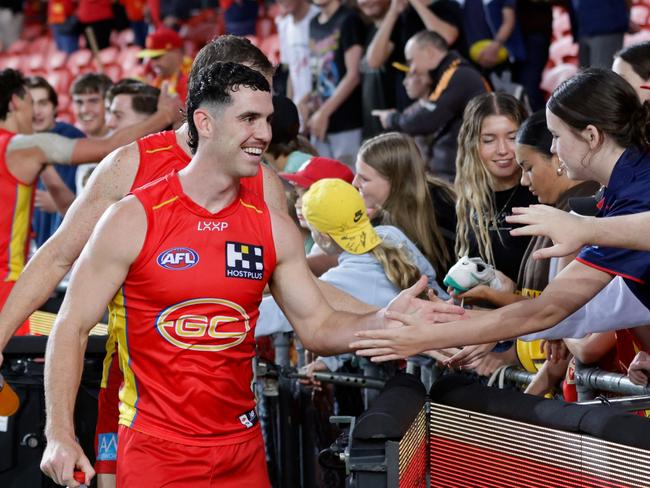 Flanders enjoys a win with Suns fans. Picture: Russell Freeman/AFL Photos via Getty Images