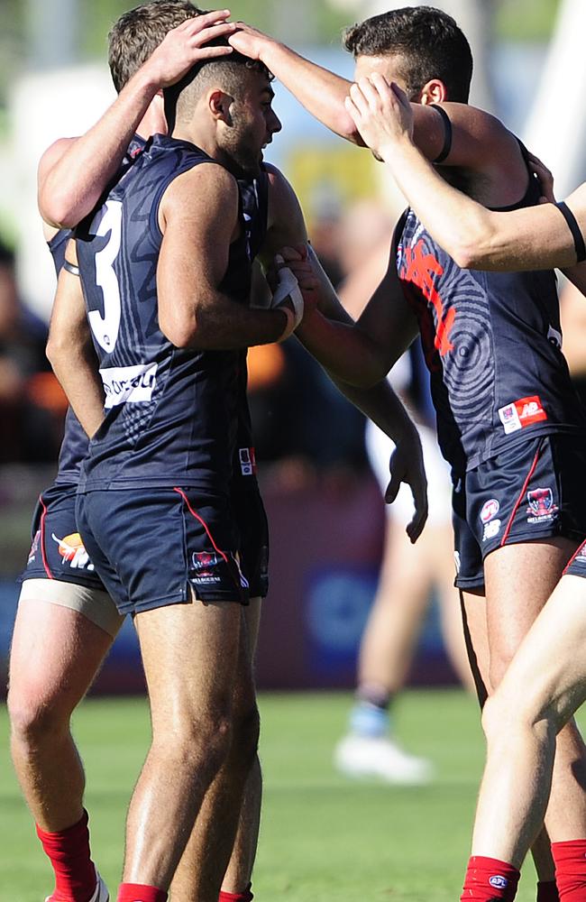 Melbourne young gun Christian Salem celebrates kicking a goal against Port Adelaide. Picture: Justin Brierty