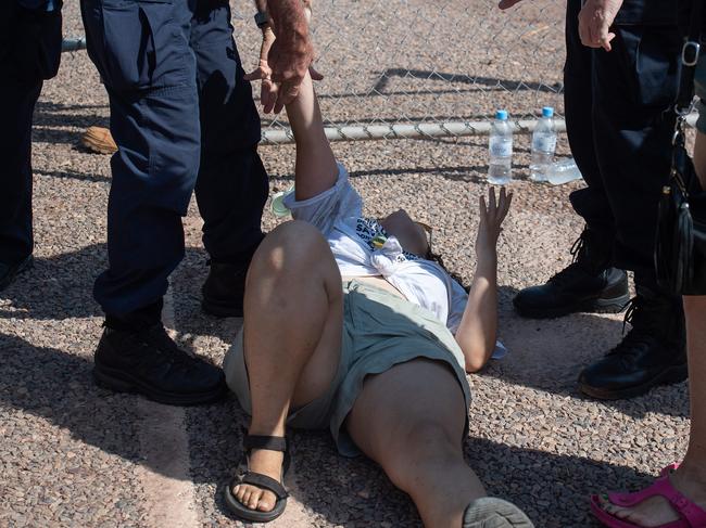 At least two people were arrested on Thursday protesting bulldozers beginning works at the Lee Point Defence Housing Australia development. Picture: Pema Tamang Pakhrin