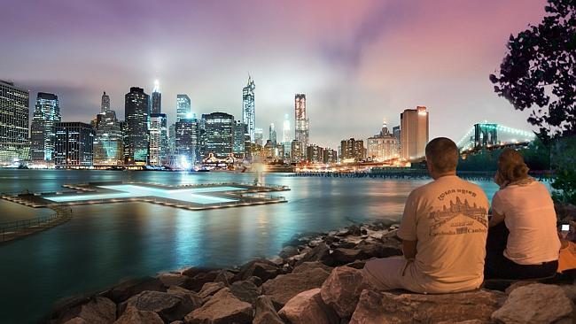 The proposed floating pool would add to the scene framed by the Manhattan skyline and Brooklyn Bridge. Picture: AP 