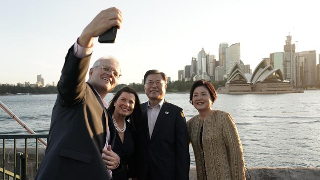 Selfie indulgence: Scott Morrison and wife Jenny capture the moment with South Korean President Moon Jae-in and his wife, Kim Jung-sook. Picture: Adam Taylor