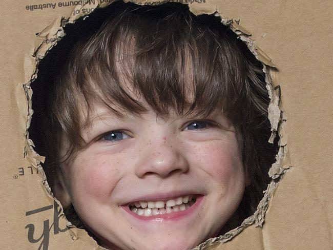 Story  about four interlinked websites covering Melbourne offering things for parents and kids to do. One of them includes a city-building workshop for kids at the Dream Factory in Footscray . Kids use recycled boxes to build a city. Austin Couzens 5 having a bit of fun with his ice cream shop before placing it the Box city. Picture: Sarah Matray