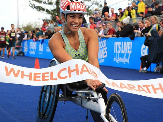 Madison de Rozario crosses the line in the Wheelchair Marathon. Picture: Gold Coast Marathon