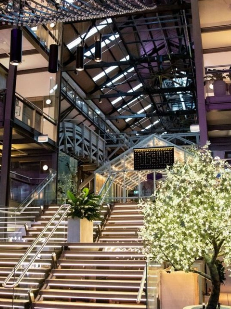 Alibi Bar &amp; Dining sits within Ovolo Woolloomooloo, and is surrounded by fairy light trees.