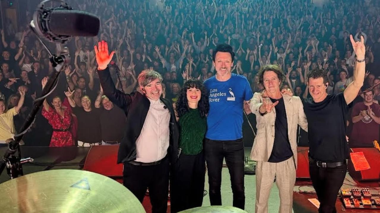 Paul Dempsey and Bernard Fanning with their band saying farewell to the crowd at the HOTA theatre on the Gold Coast, in the final show of their national tour.