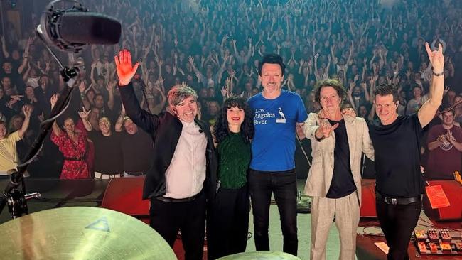 Paul Dempsey and Bernard Fanning with their band saying farewell to the crowd at the HOTA theatre on the Gold Coast, in the final show of their national tour.
