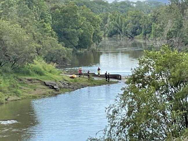 A QFES spokeswoman said the reports were a group of three had been swimming in the area, but only one had surfaced. Photo: Scott Kovacevic