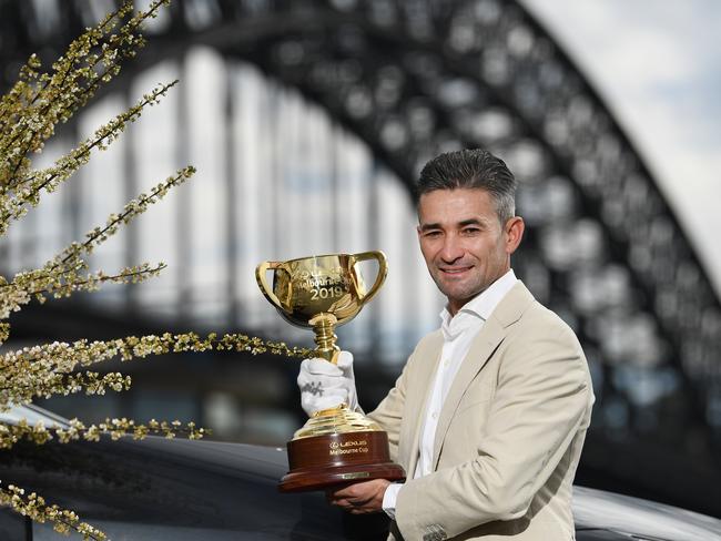 Two-time Melbourne Cup winning jockey Corey Brown against the backdrop of the Sydney Harbour Bridge in September. Picture: AAP Image