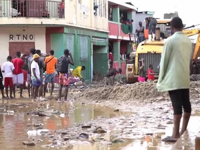 Deadly floods in Haiti inundate homes and streets