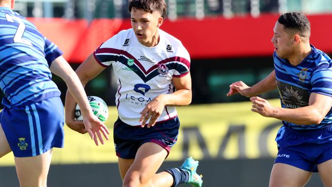 between Ipswich SHS (white shirt) National Schoolboys Cup rugby league grand final against Patrician Brothers Fairfield on September 14. Picture: David Clark