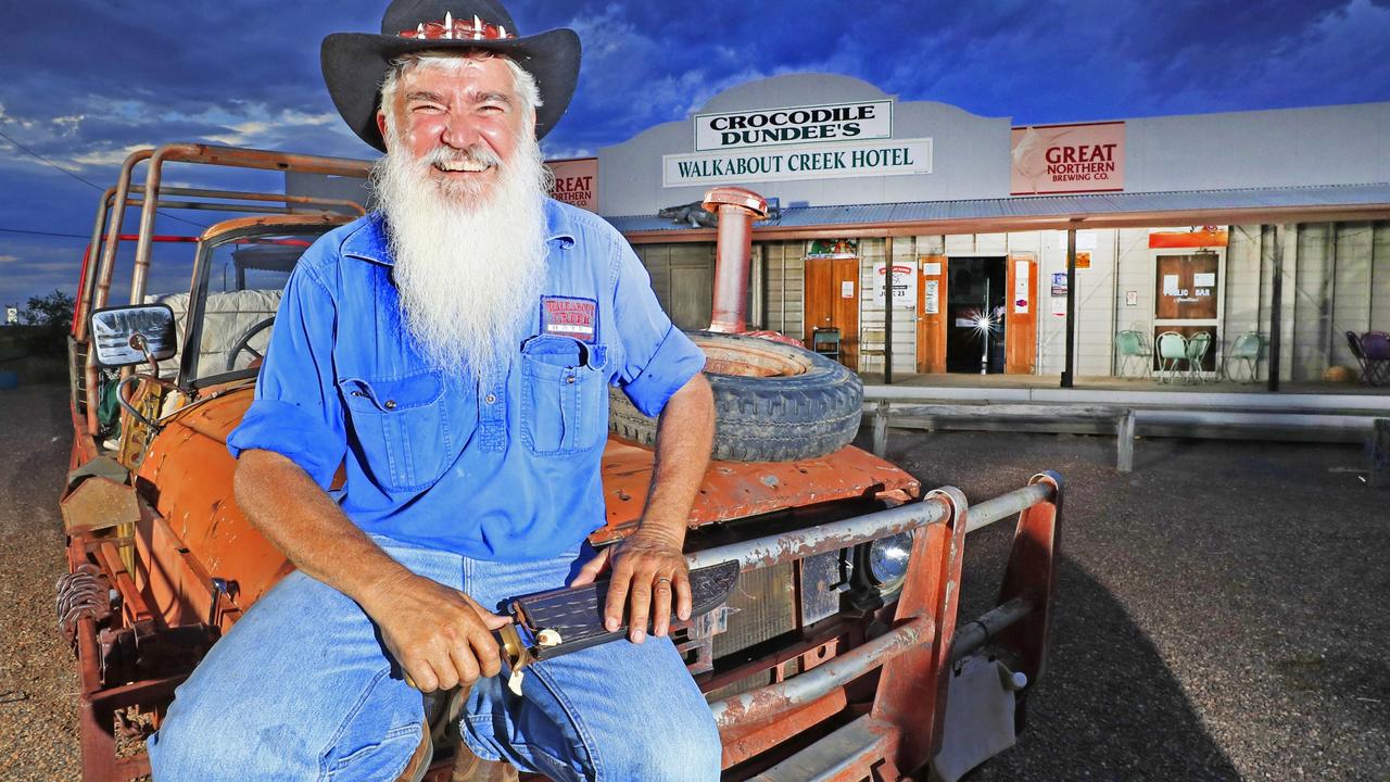 Frank Wust owner of the Walkabout Creek Hotel out the front of the pub where the Crocodile Dundee was filmed. Picture: Lachie Millard