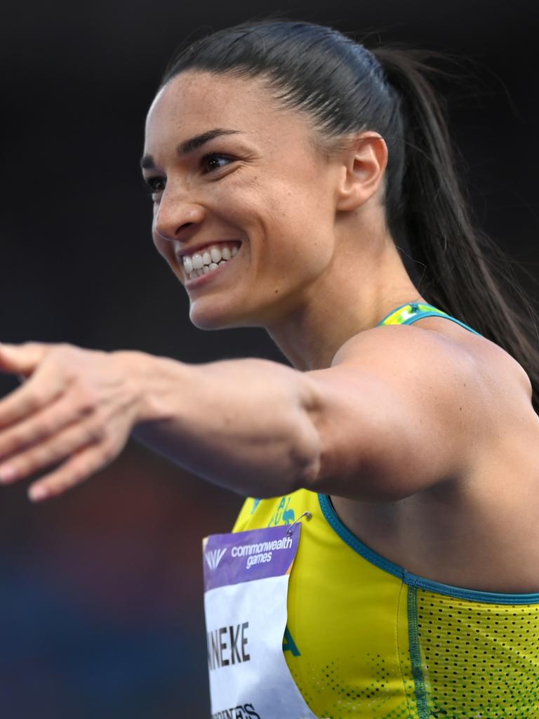 Michelle Jenneke has reason to smile. Photo by Shaun Botterill/Getty Images.