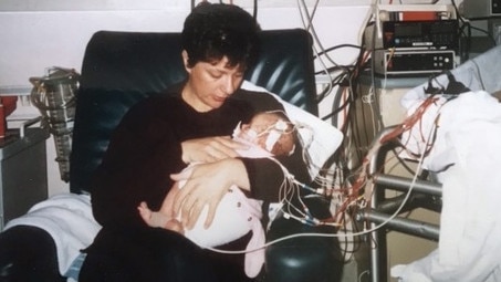 Kathleen Folbigg with daughter Laura just after being born at Westmead Children Hospital.