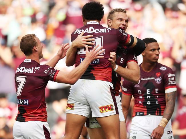 SYDNEY, AUSTRALIA - APRIL 25:  Tom Trbojevic of the Sea Eagles celebrates with team mates after scoring a try during the round seven NRL match between the Wests Tigers and the Manly Sea Eagles at Bankwest Stadium, on April 25, 2021, in Sydney, Australia. (Photo by Matt King/Getty Images)