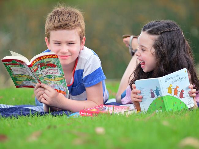 Charlie, 8, and Chloe, 5, with their favourite books. Picture: Nicki Connolly