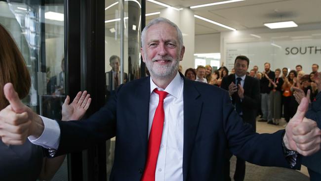 Labour Party Leader Jeremy Corbyn gives a thumbs up as he arrives at Labour Party headquarters in central London on June 9. Picture: Daniel Leal-Olivas/AFP