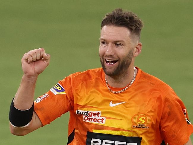 PERTH, AUSTRALIA - DECEMBER 08: Andrew Tye of the Scorchers celebrates the wicket of Jimmy Peirson of the Heat during the Men's Big Bash League match between the Perth Scorchers and the Brisbane Heat at Optus Stadium, on December 08, 2021, in Perth, Australia. (Photo by Paul Kane/Getty Images)