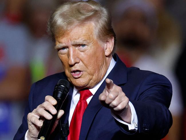 Former US President and Republican presidential candidate Donald Trump gestures as he speaks at a campaign rally at the Fiserv Forum in Milwaukee, Wisconsin, November 1, 2024. (Photo by KAMIL KRZACZYNSKI / AFP)