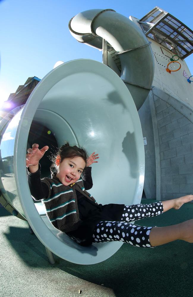 Emily Green, sliding at the Frew Park playground, Milton. Picture: Liam Kidston.