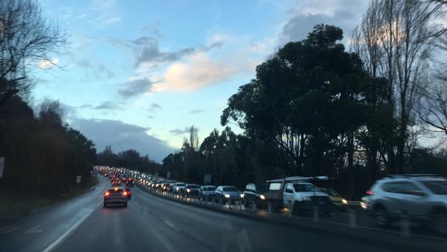 South-bound traffic banked up on the Southern Outlet approaching Mt Nelson. Picture: THOMAS YOUNG