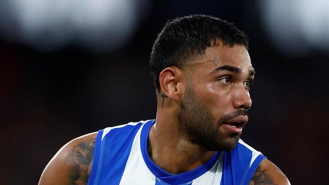 MELBOURNE, AUSTRALIA - AUGUST 12: Tarryn Thomas of the Kangaroos in action during the 2023 AFL Round 22 match between the North Melbourne Kangaroos and the Essendon Bombers at Marvel Stadium on August 12, 2023 in Melbourne, Australia. (Photo by Michael Willson/AFL Photos via Getty Images)