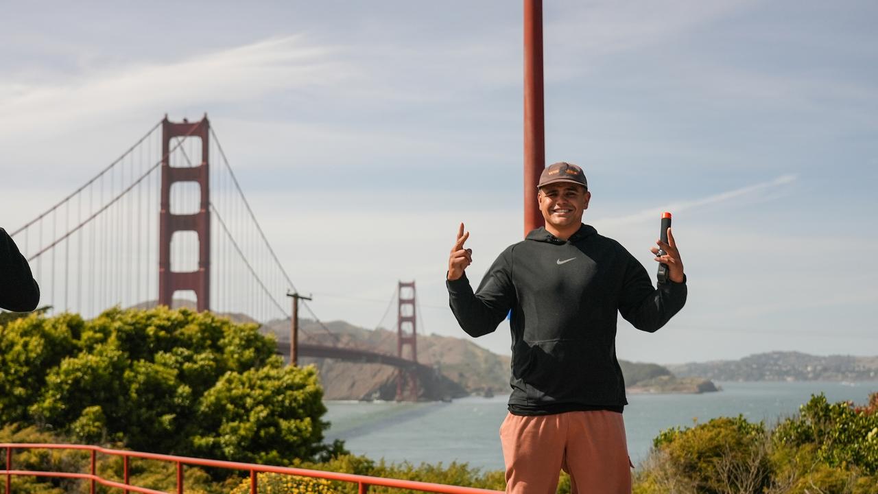 Latrell Mitchell’s having a grand old time on his US adventure, pictured here next to the Golden Gate Bridge in San Francisco. Picture: Sunny Brar/South Sydney Rabbitohs.