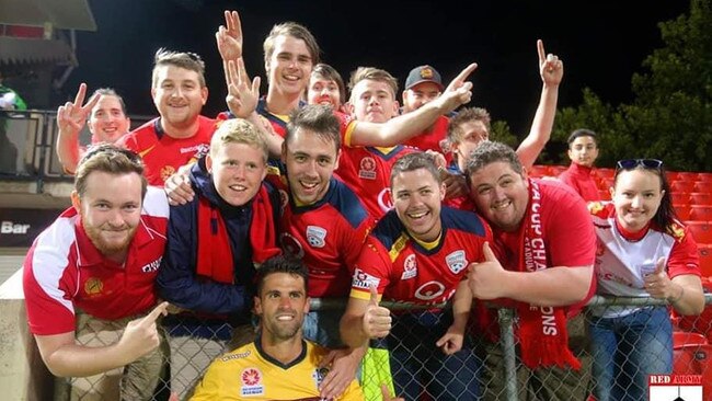 Adelaide United fan Todd Stansborough (third left, top row) has helped start the bandwagon for the Belarus Premier League.