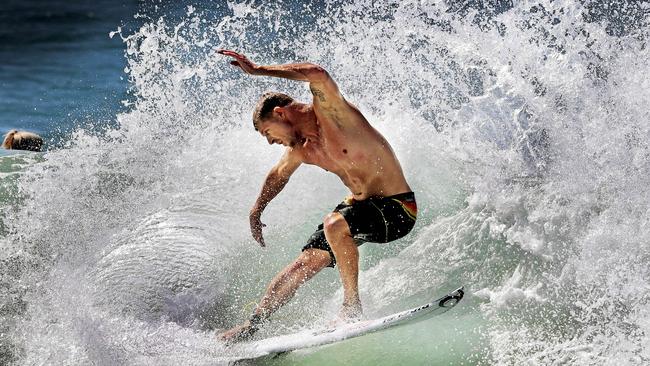 Mick Fanning enjoying great swell at Snapper Rocks. Pic by Luke Marsden.