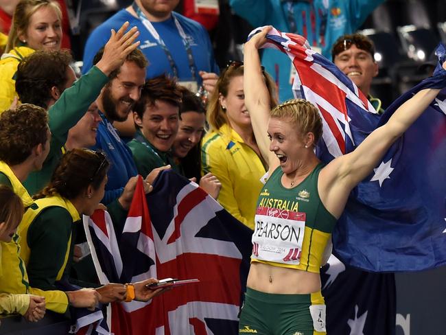 Australia's Sally Pearson celebrates after winning gold in the women's 100m hurdles final at the 2014 Commonwealth Games in Glasgow. Picture: AAP